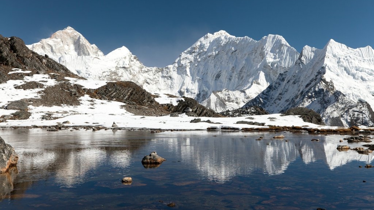 Panoramic view of Mount Makalu above lake near Kongma La pass three passes trek way to Everest base camp Khumbu valley Sagarmatha national park Nepal